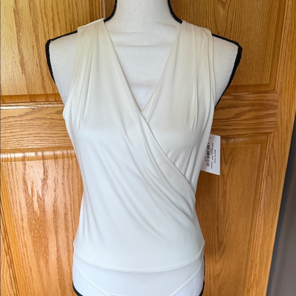 mod on trend Tops - NWT MOD on Trend White Sleeveless Wrap Bodysuit